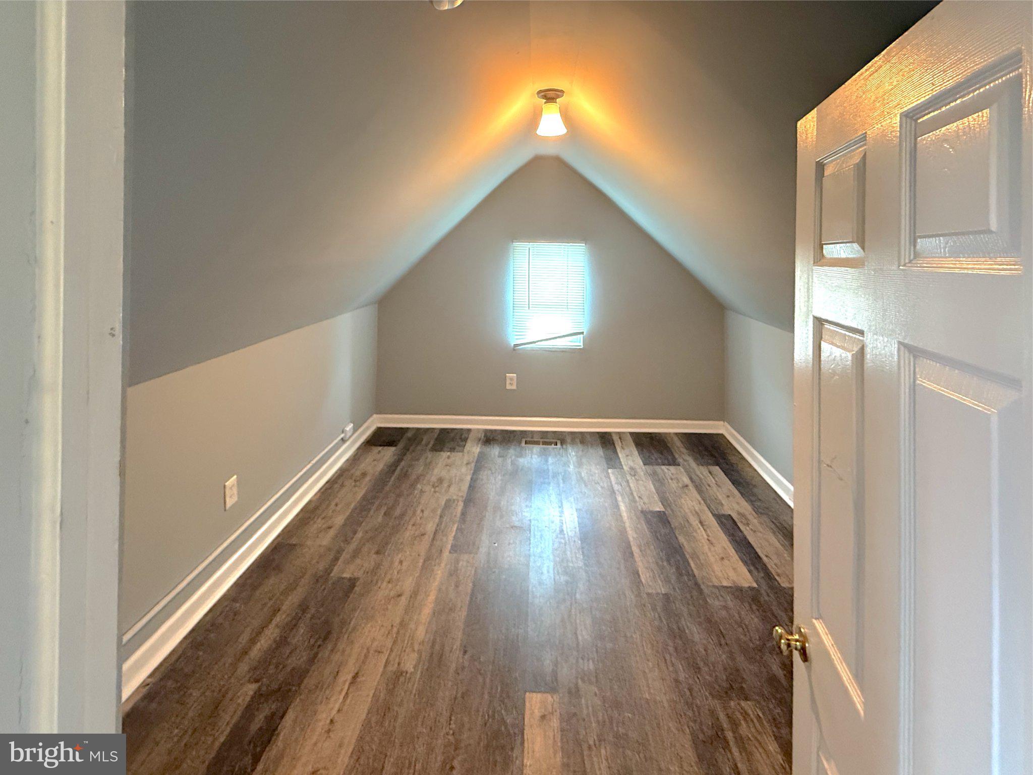304 Collins Avenue, Unit 2 Baltimore, MD 21229 - Photo 14 of 17 Charming attic space with natural light.