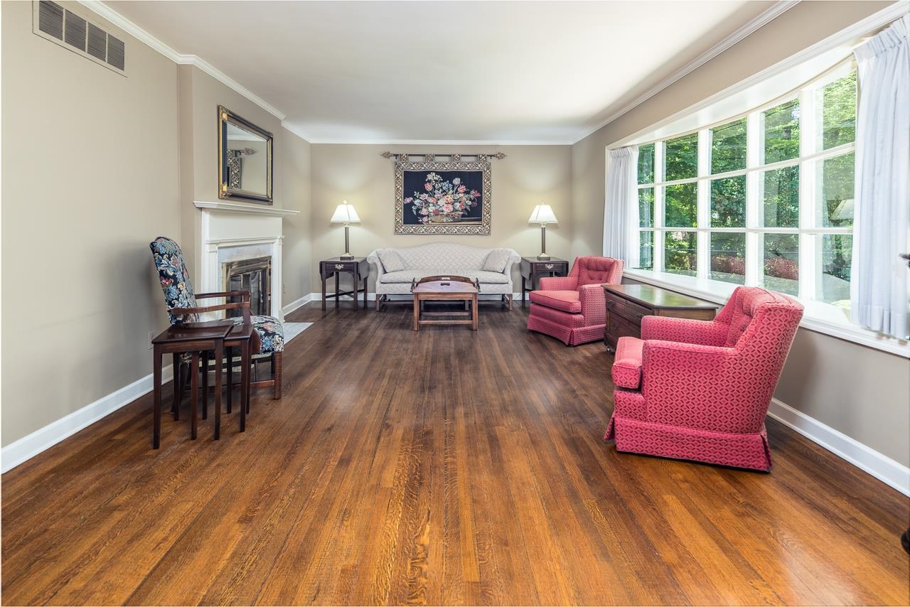 1269 Hayne Road Memphis, TN 38119 - Photo 5 of 24 a living room with furniture and wooden floor