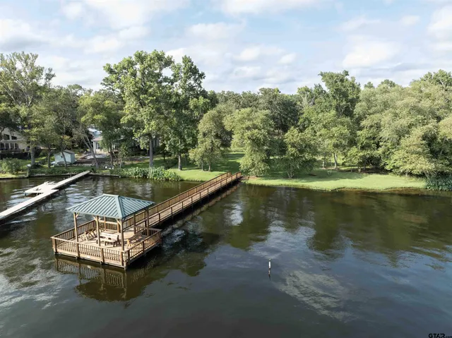 a view of a swimming pool with a lake view