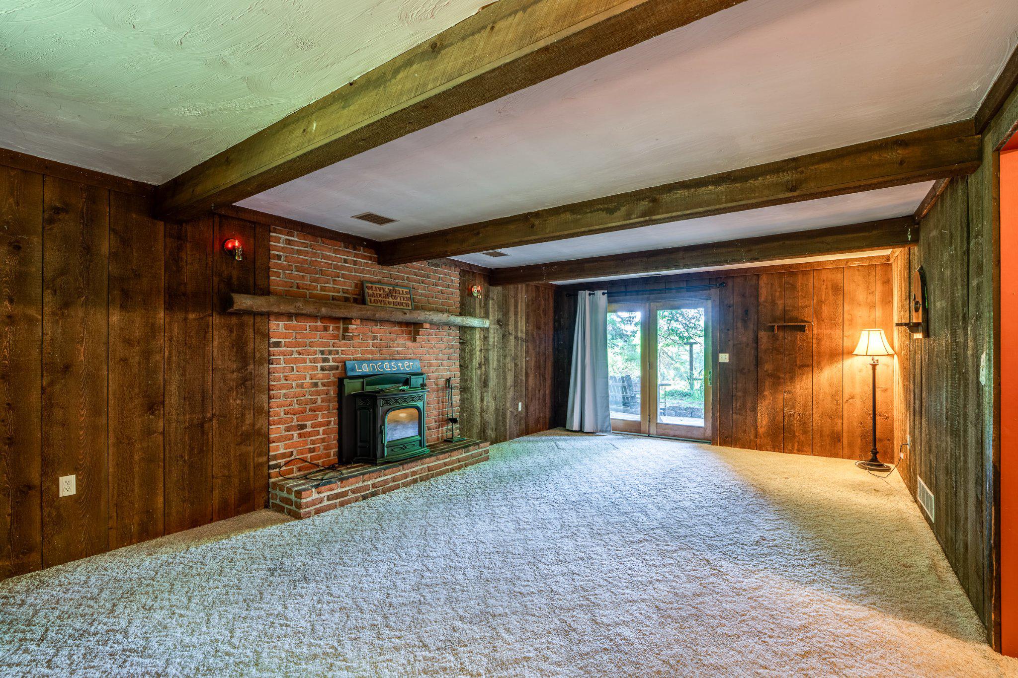 12 Buck Heights Road Holtwood, PA 17532 - Photo 27 of 42 Rustic family room with pellet stove