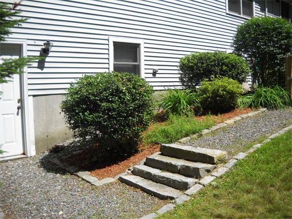 160 Pierce Road Townsend, MA 01469 - Photo 4 of 23 a view of a house with a yard and plants