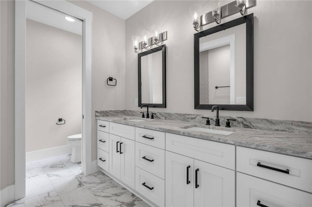 1230 Melton Road, Unit 216 West Union, SC 29696 - Photo 23 of 49 Dual vanity with generous counter space, a serene and elegant retreat.