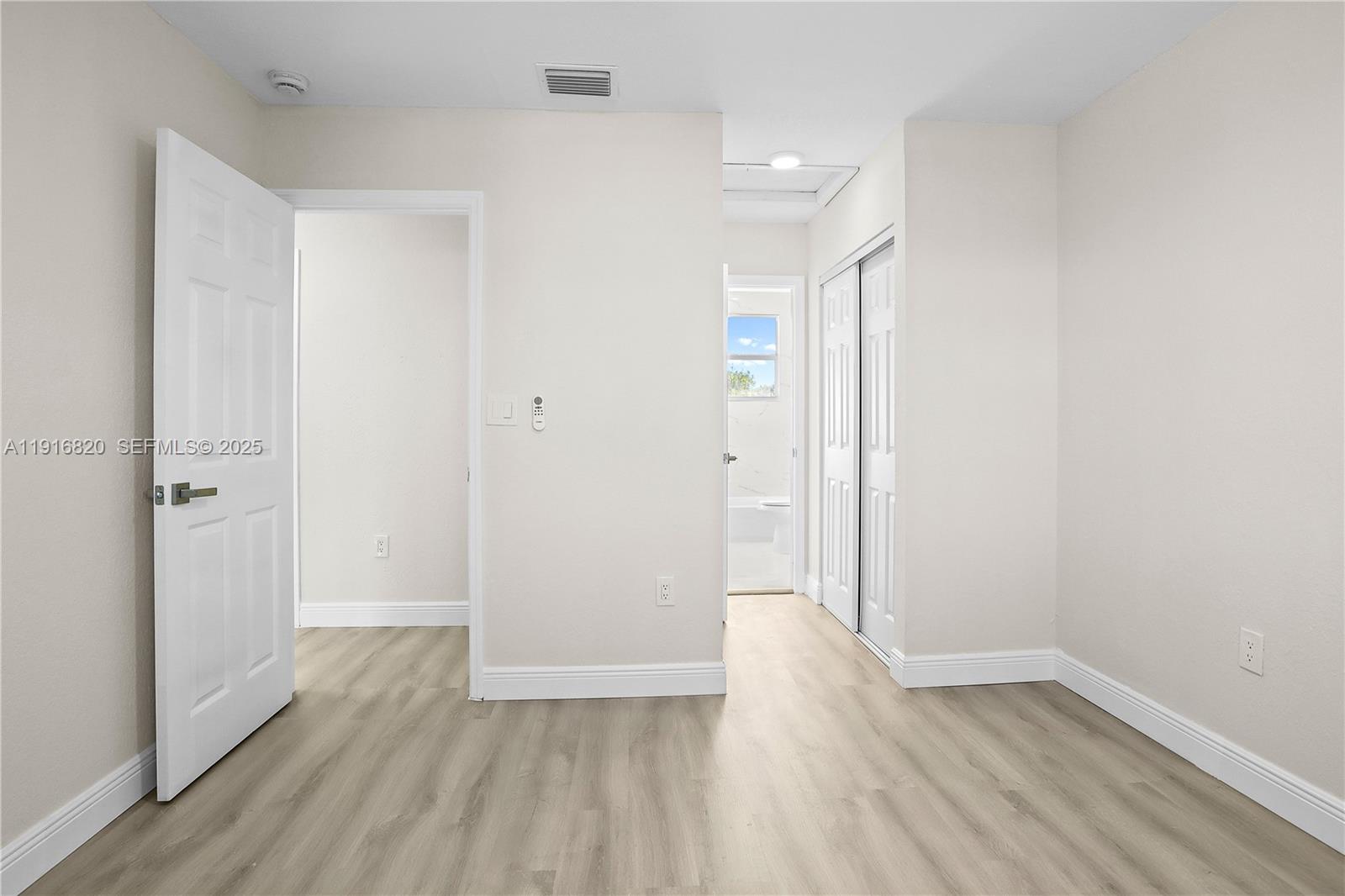 1223 Northwest 125th Terrace Sunrise, FL 33323 - Photo 65 of 89 a view of hallway with wooden floor