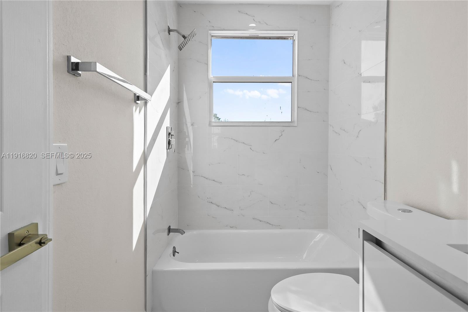 1223 Northwest 125th Terrace Sunrise, FL 33323 - Photo 69 of 89 a bathroom with a sink toilet and bathtub