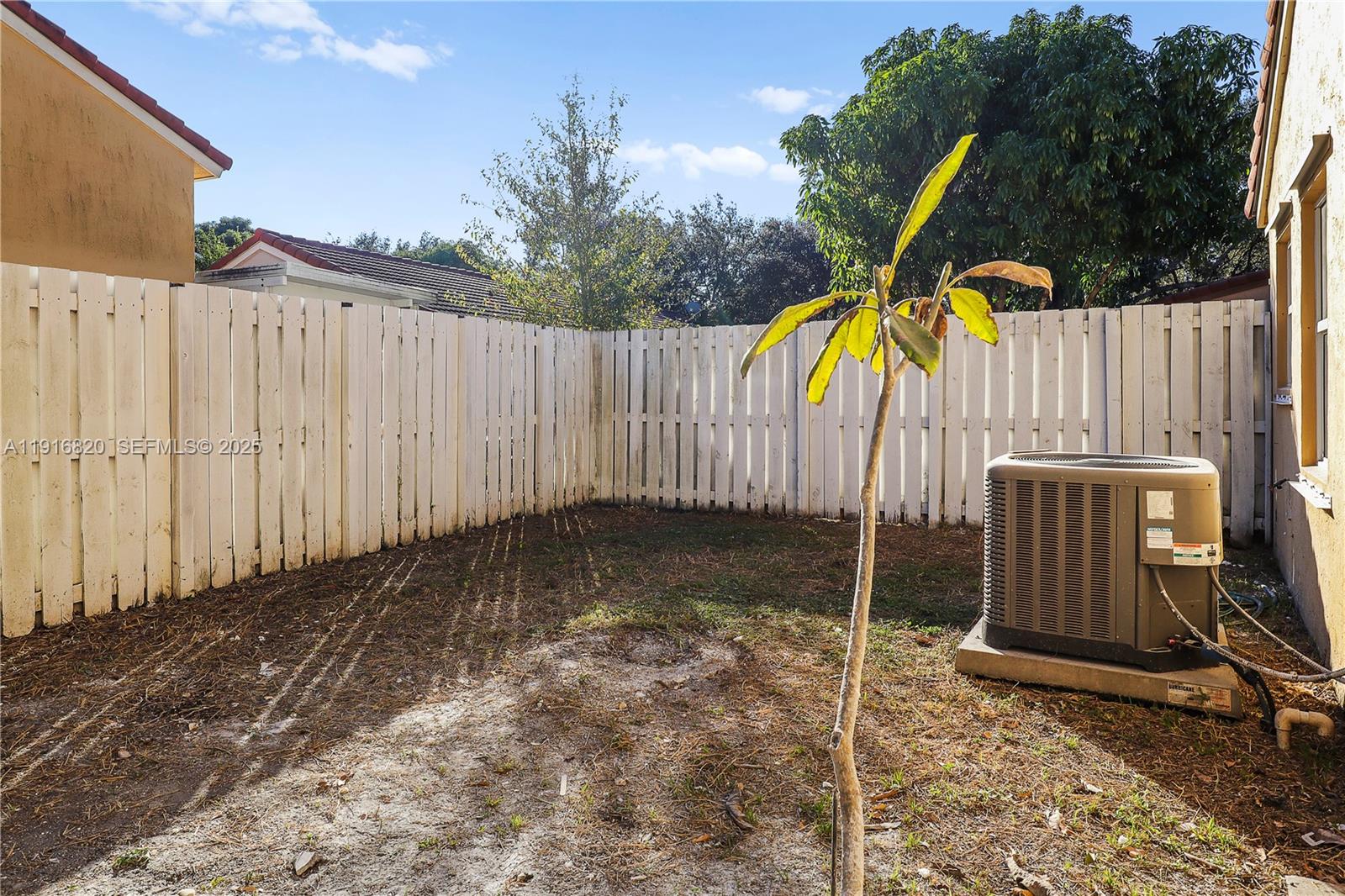 1223 Northwest 125th Terrace Sunrise, FL 33323 - Photo 78 of 89 a view of a backyard with a small cabin