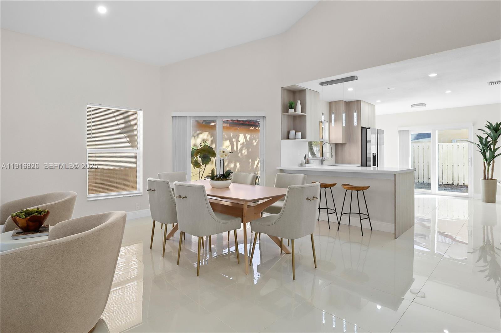 1223 Northwest 125th Terrace Sunrise, FL 33323 - Photo 8 of 89 a dining room with furniture and window