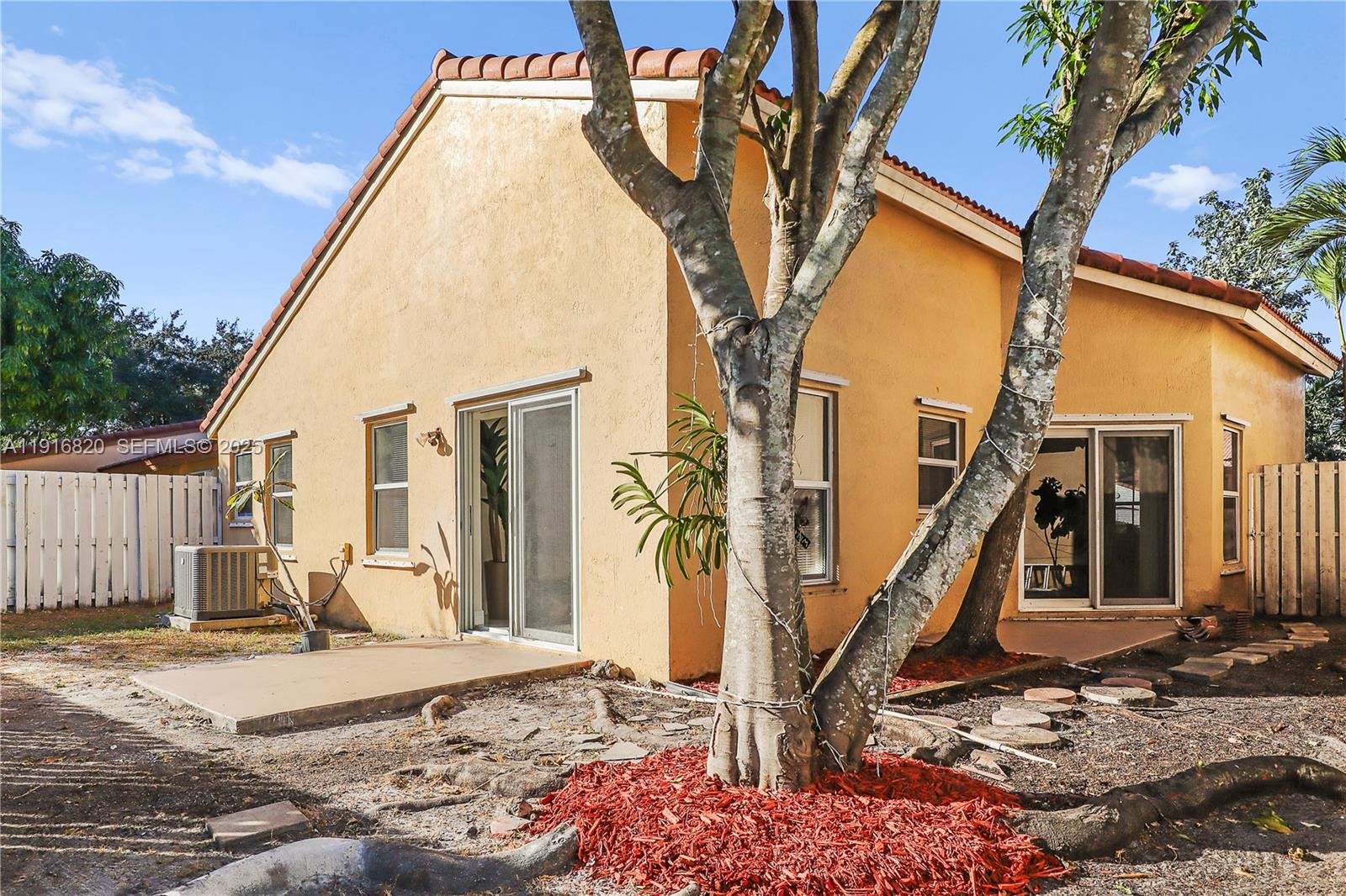 1223 Northwest 125th Terrace Sunrise, FL 33323 - Photo 83 of 89 a view of a house with basketball court