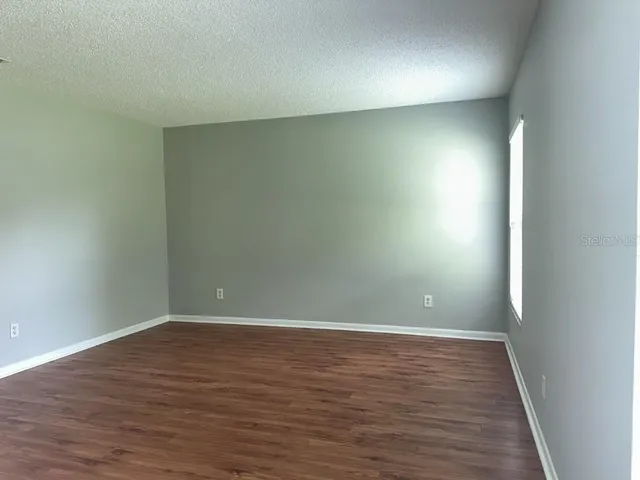 a bathroom with a shower and a toilet