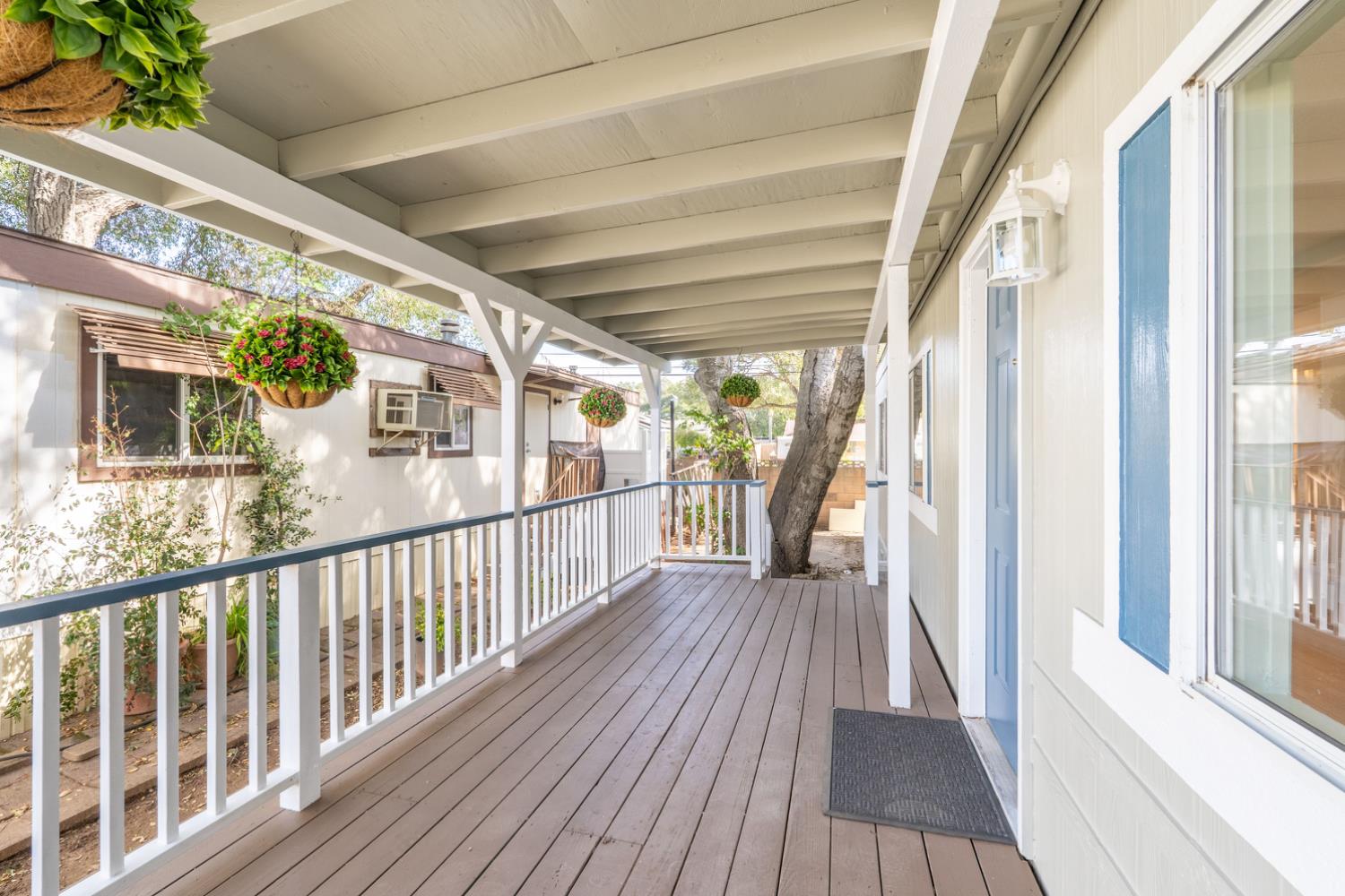 1273 South Rice Road, Unit 4 Ojai, CA 93023 - Photo 4 of 26 a view of a porch with wooden floor