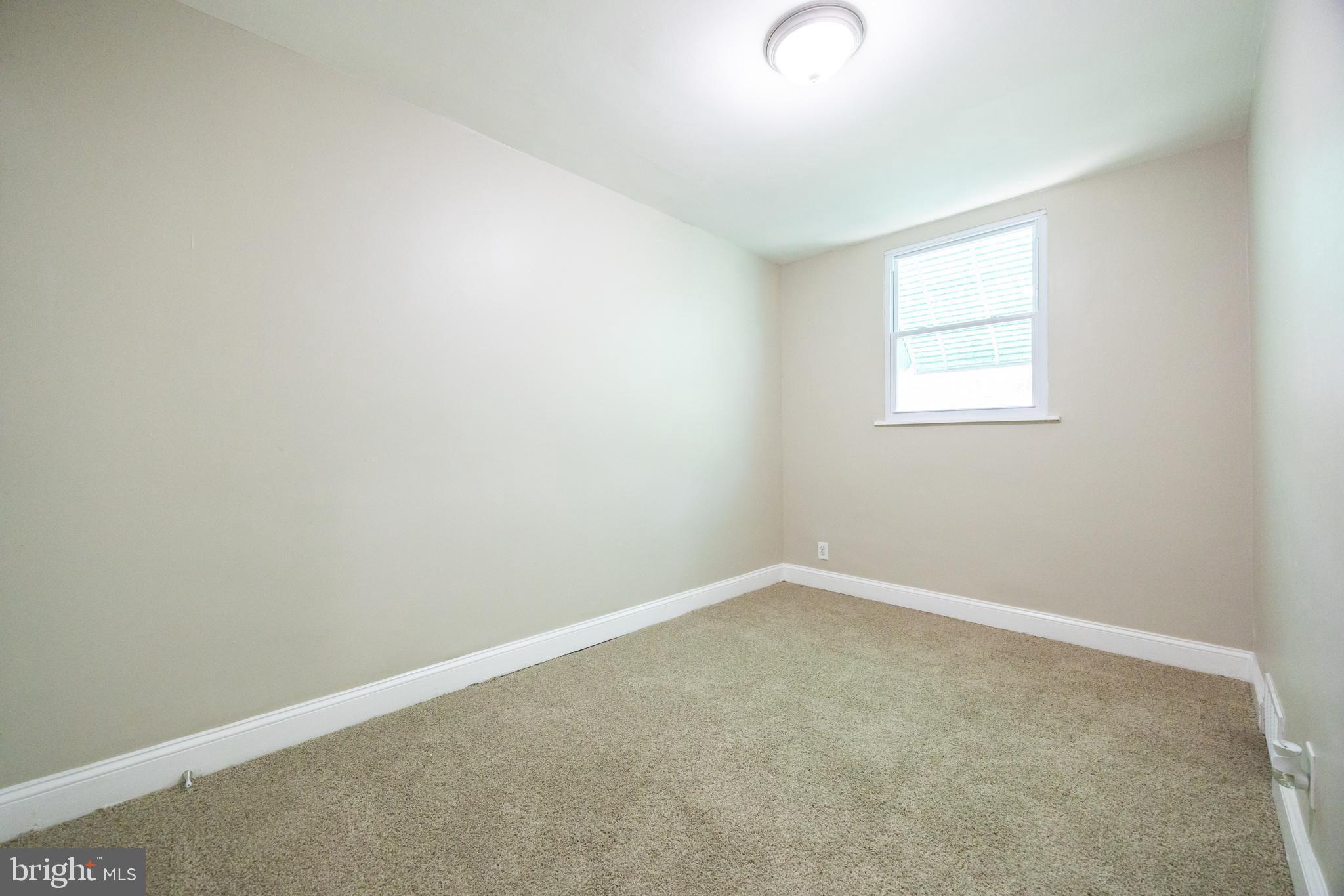 621 North 67th Street Philadelphia, PA 19151 - Photo 20 of 20 an empty room with a window