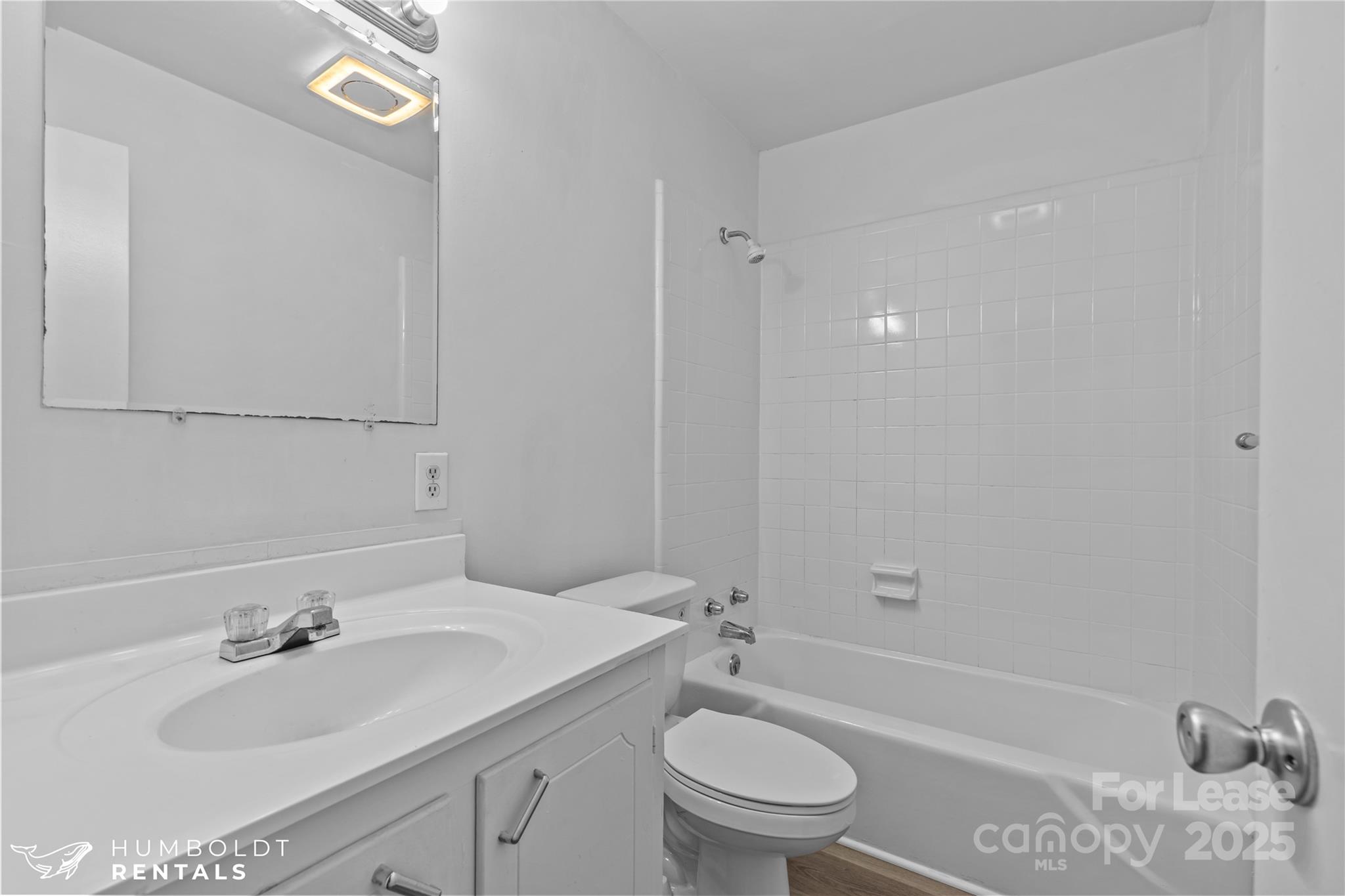 301 Eagle Road, Unit 2 Belmont, NC 28012 - Photo 9 of 15 a bathroom with a granite countertop sink toilet and shower