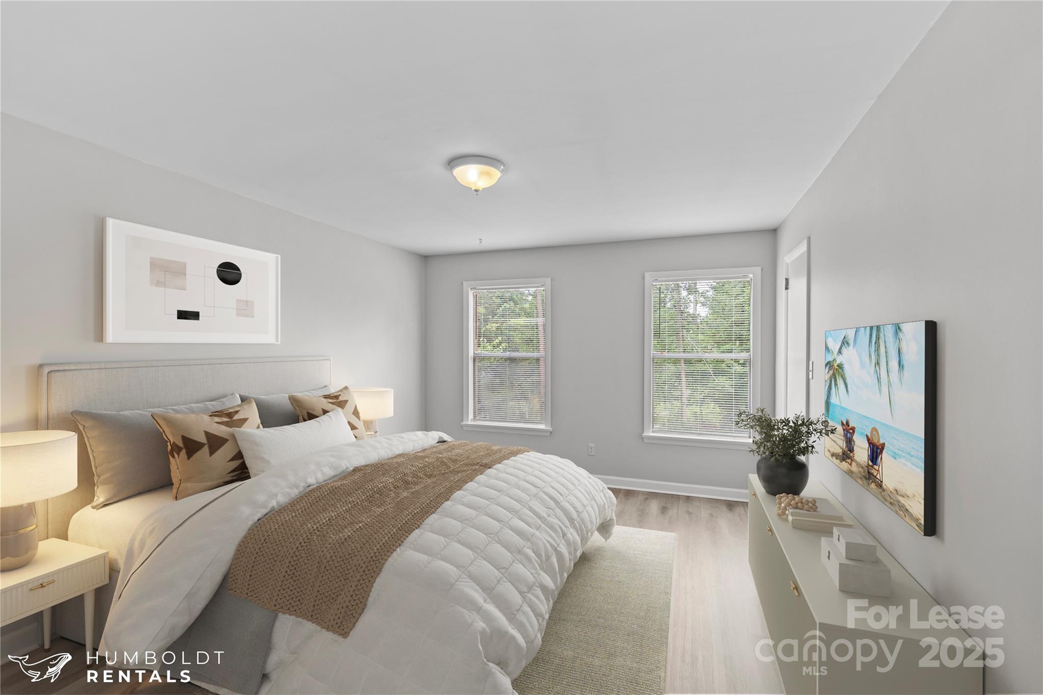 301 Eagle Road, Unit 2 Belmont, NC 28012 - Photo 10 of 15 a bedroom with a bed and glass window