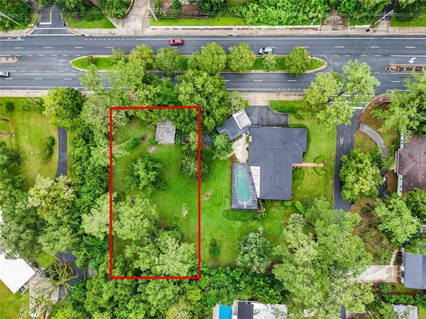 an aerial view of a house with a garden