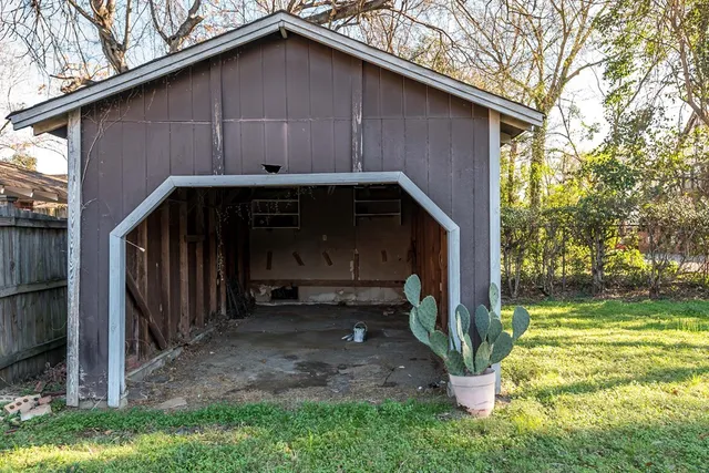 a view of a park with large trees