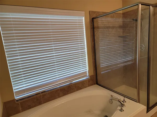 a view of a bathroom with a shower