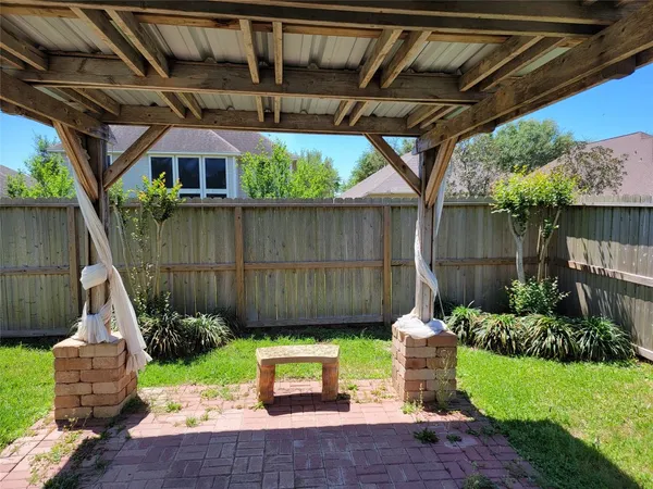 a garden view with a seating space