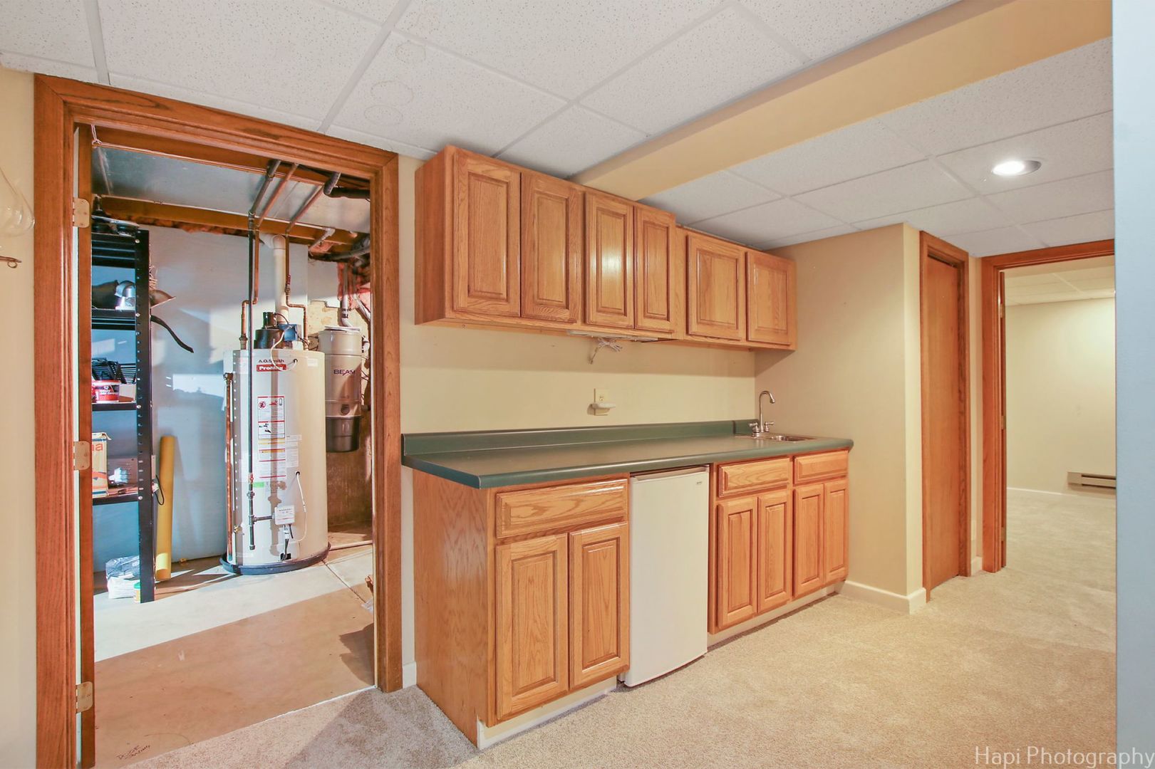 3515 Oak Ridge Road Woodstock, IL 60098 - Photo 54 of 75 a kitchen with stainless steel appliances granite countertop a refrigerator and cabinets