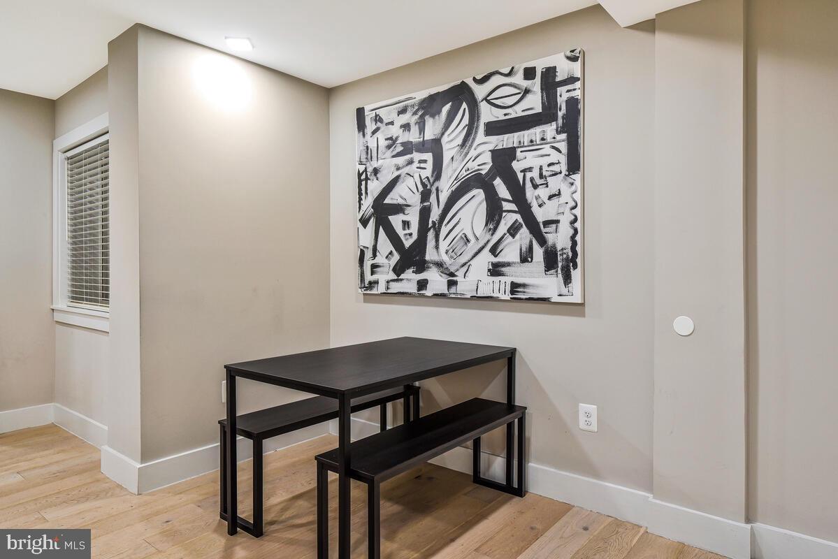 1028 Bladensburg Road Northeast, Unit 5 Washington, DC 20002 - Photo 13 of 29 a view of a room with a table and chairs
