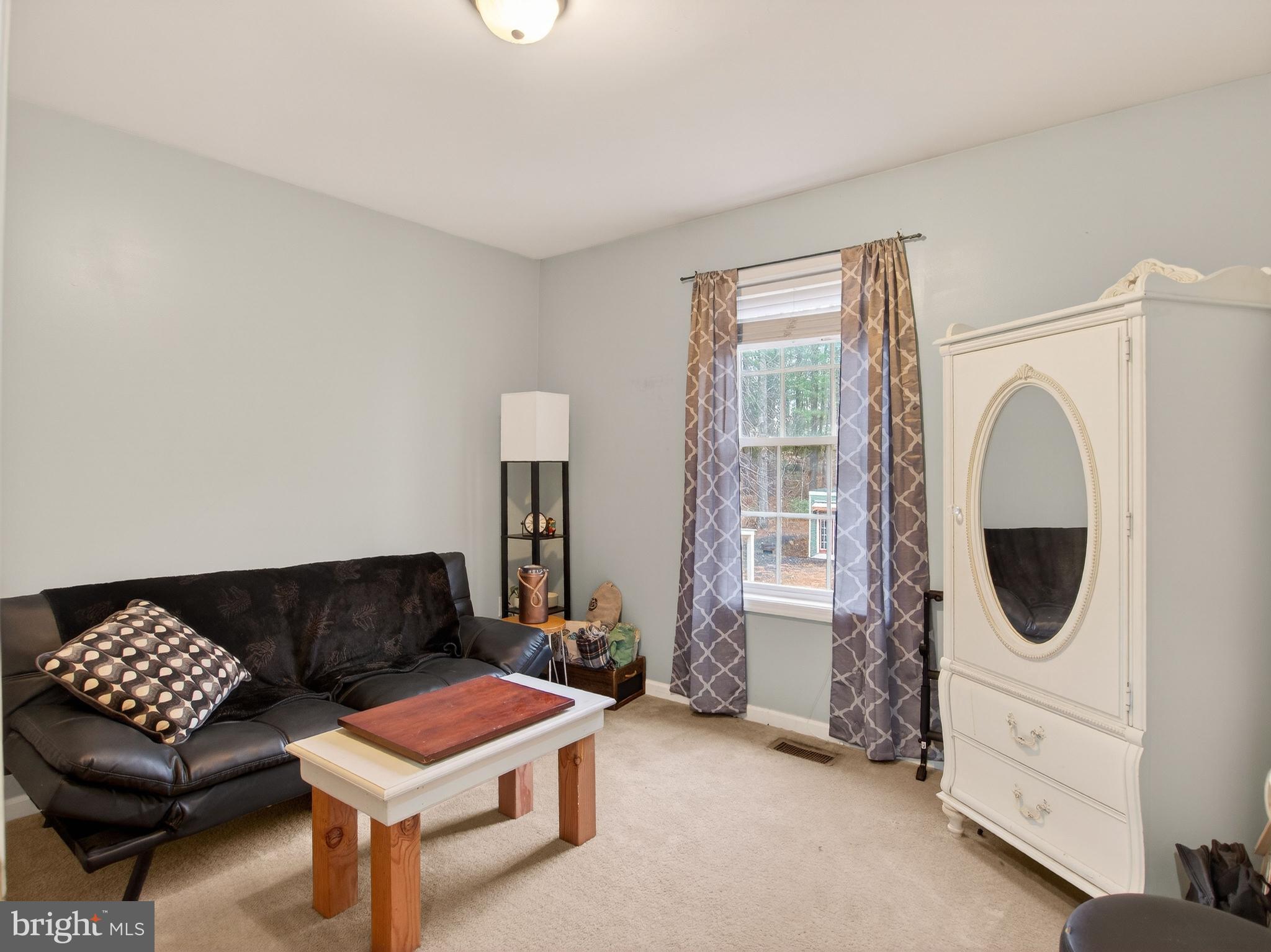 2586 West Hoover Road Haywood, VA 22722 - Photo 20 of 35 a living room with furniture and a window