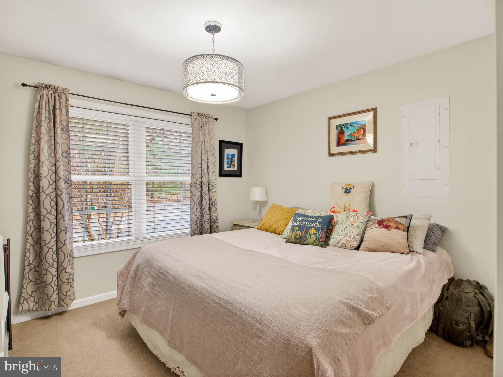 2586 West Hoover Road Haywood, VA 22722 - Photo 21 of 35 a bedroom with a bed and a large window