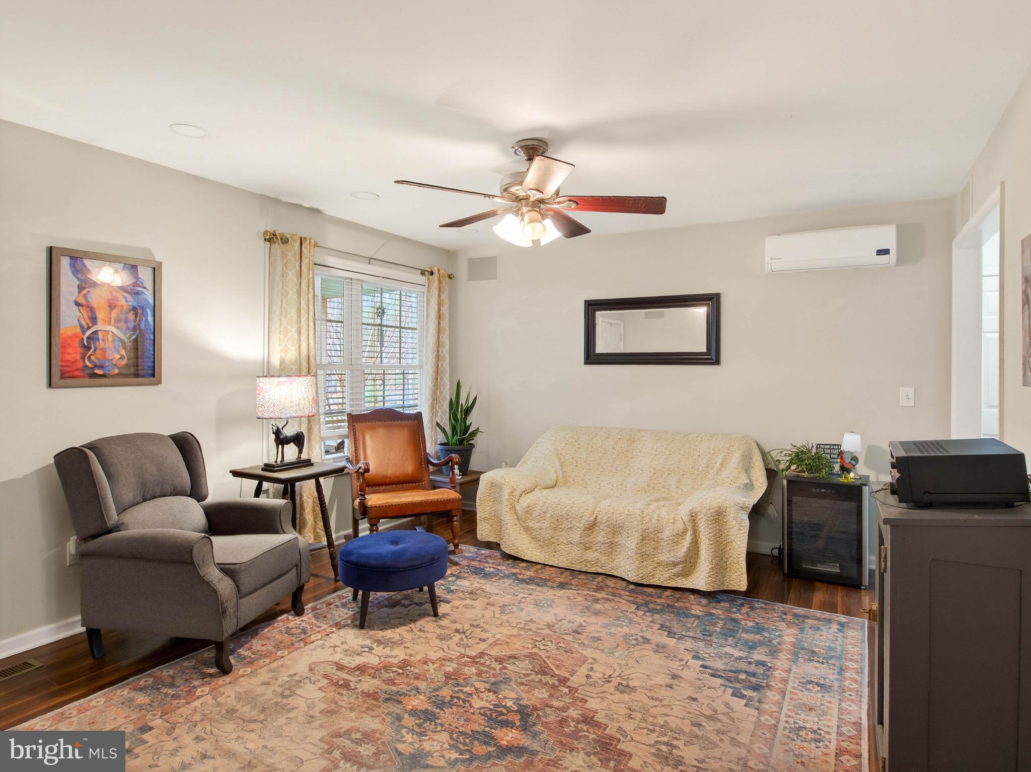 2586 West Hoover Road Haywood, VA 22722 - Photo 9 of 35 a living room with furniture a bed and a couch