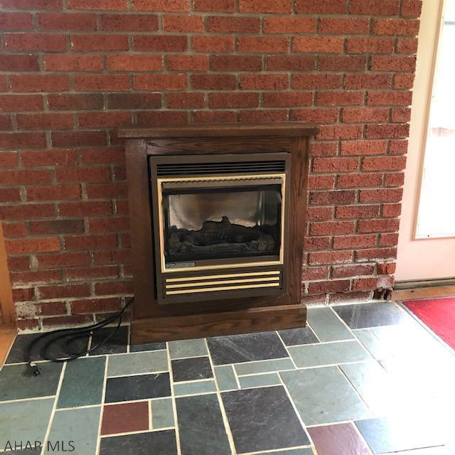 525 Egolf Road Bedford, PA 15522 - Photo 22 of 61 a room with a sink and a black white checkered floor