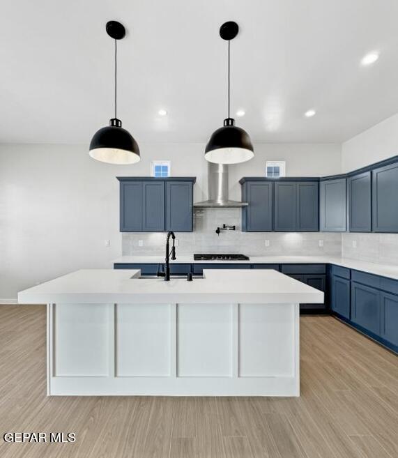 7248 Cimarron Rim Drive El Paso, TX 79911 - Photo 30 of 48 a kitchen with stainless steel appliances kitchen island a sink a stove a counter space and cabinets