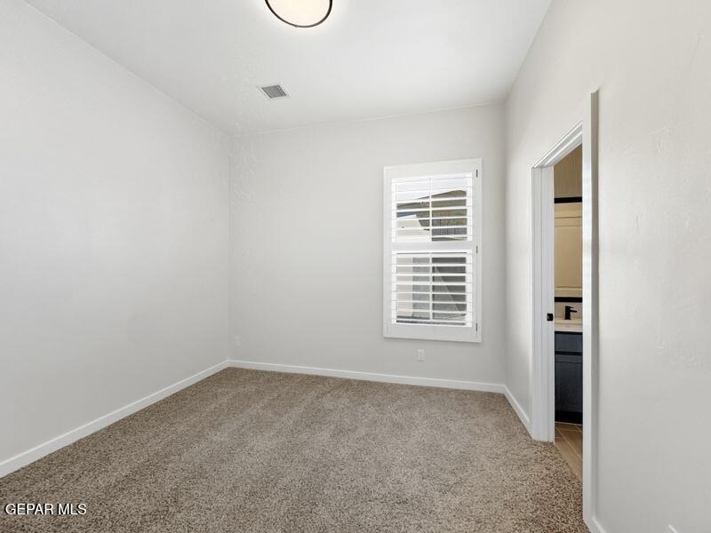 7248 Cimarron Rim Drive El Paso, TX 79911 - Photo 39 of 48 a view of a room that has a window in it