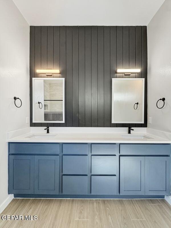 7248 Cimarron Rim Drive El Paso, TX 79911 - Photo 4 of 48 a bathroom with a sink and a large mirror