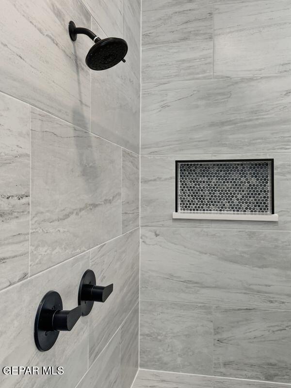 7248 Cimarron Rim Drive El Paso, TX 79911 - Photo 7 of 48 a bathroom with a shower