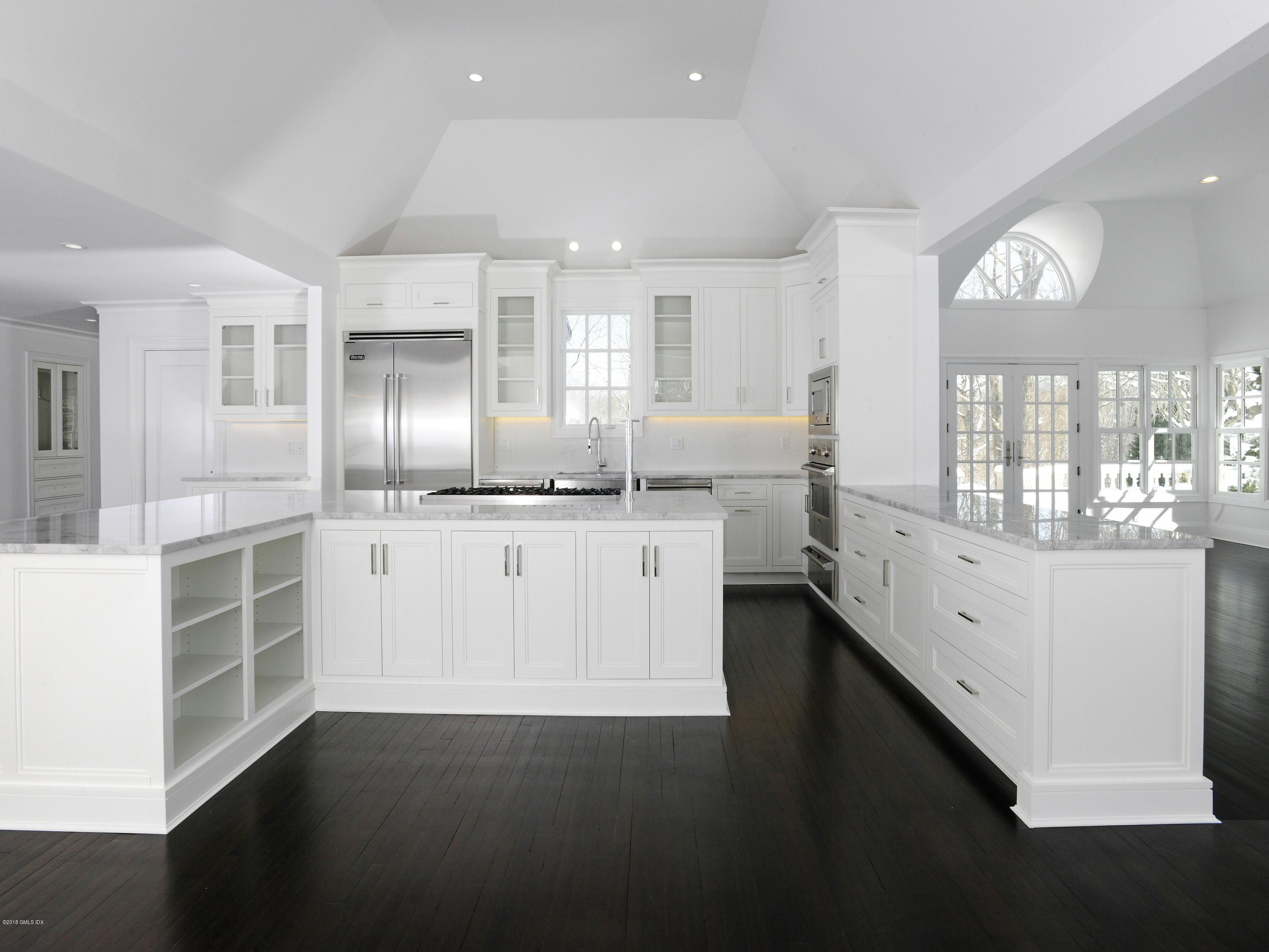 36 Perkins Road Greenwich, CT 06830 - Photo 17 of 26 a large white kitchen with a large window