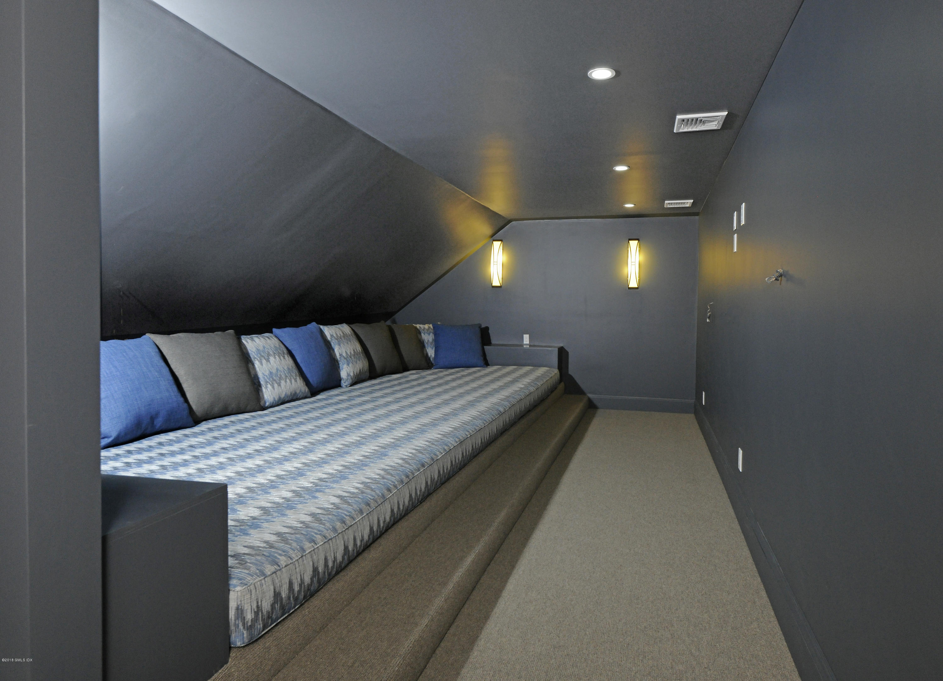 36 Perkins Road Greenwich, CT 06830 - Photo 25 of 26 a bed room with a bed and a night stand