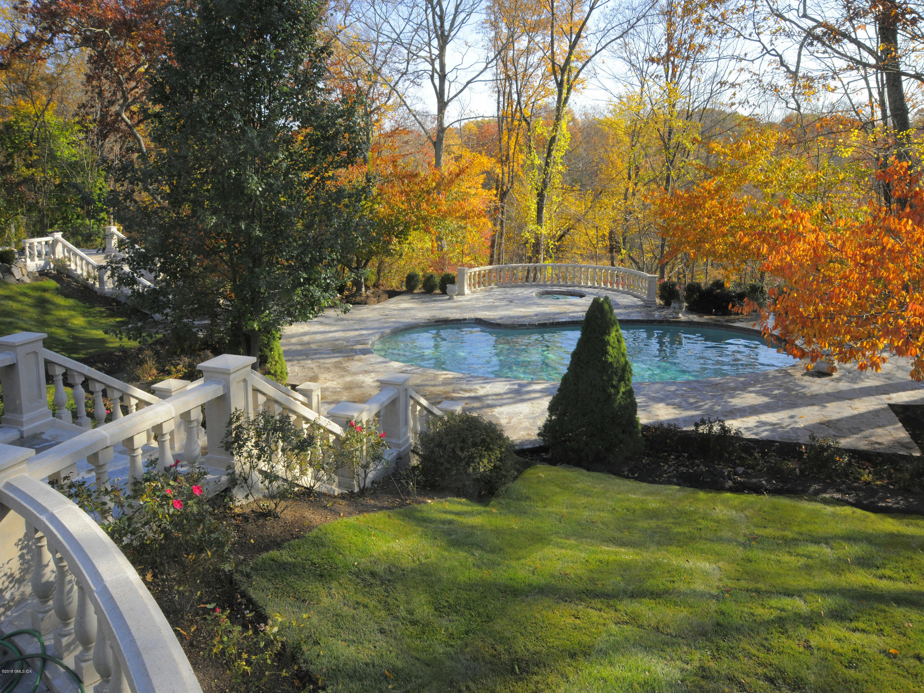 36 Perkins Road Greenwich, CT 06830 - Photo 7 of 26 a view of a backyard of the house