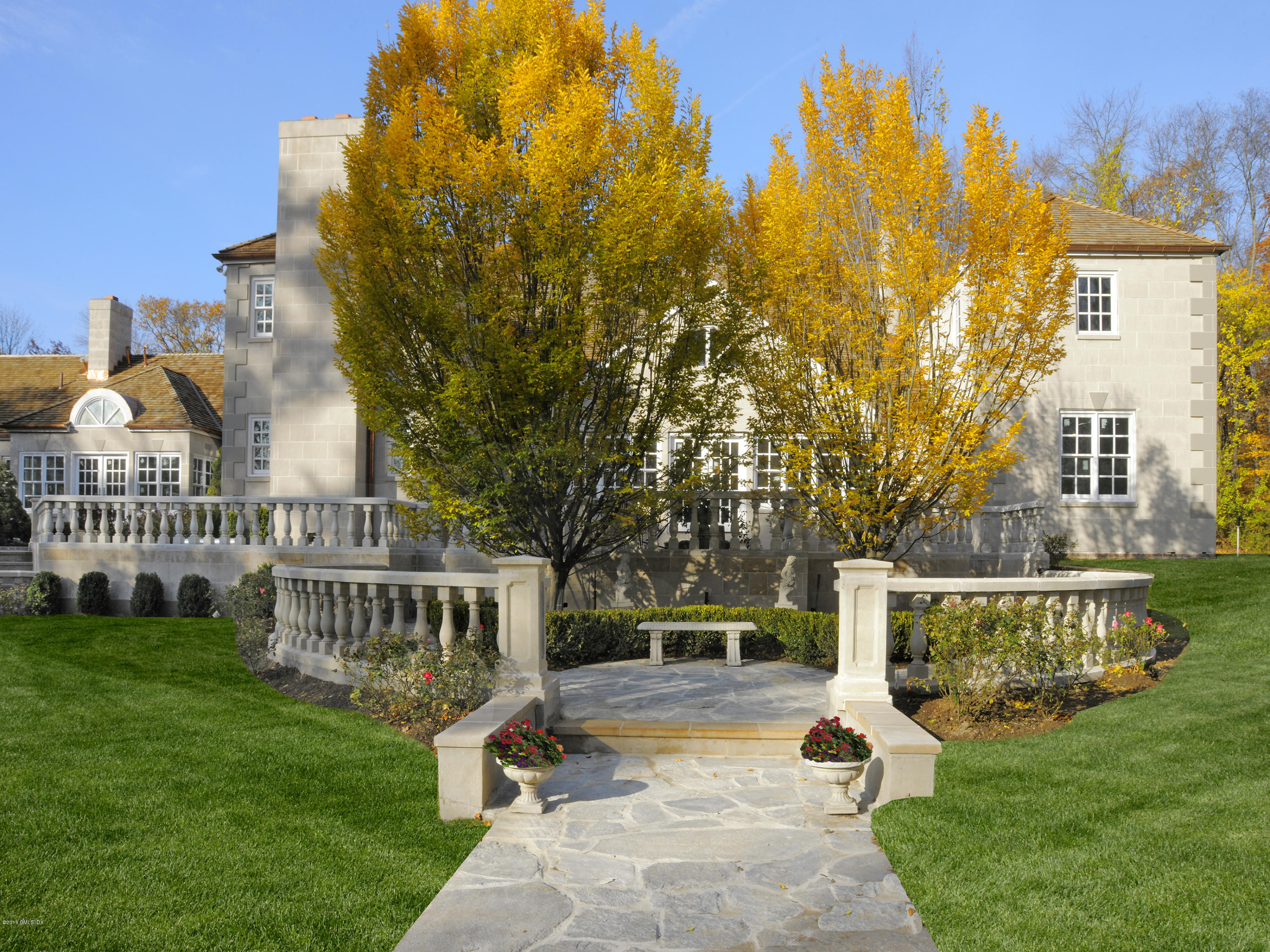 36 Perkins Road Greenwich, CT 06830 - Photo 10 of 26 a view of a house with backyard and sitting area