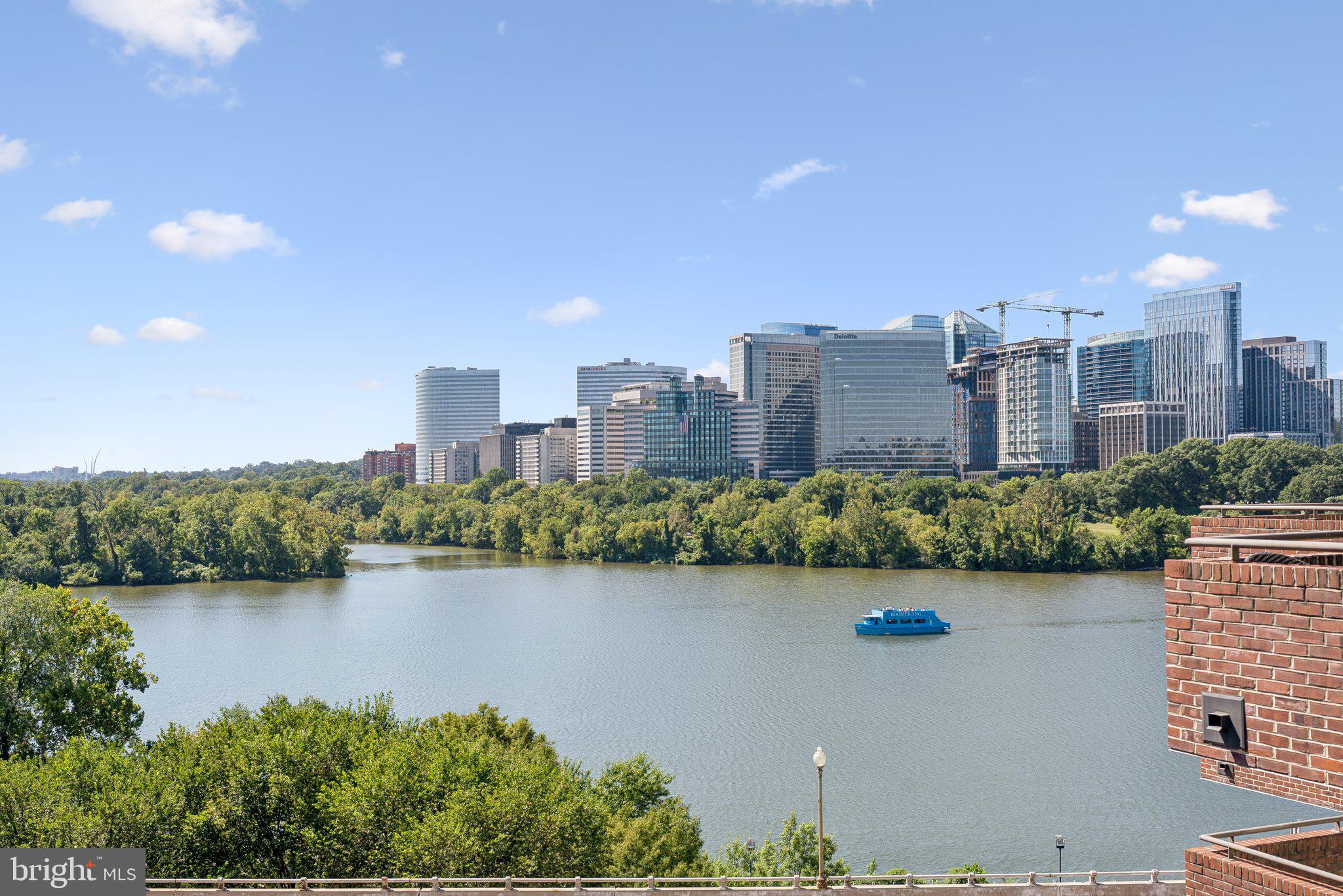 a view of a lake with a city