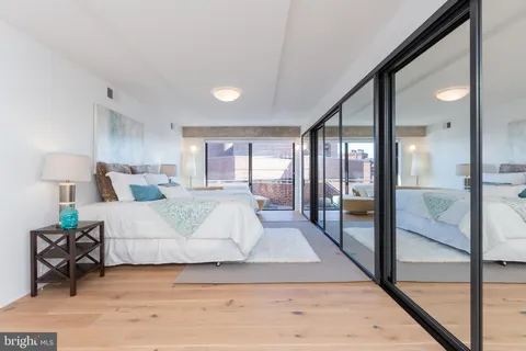 a view of roof deck with patio