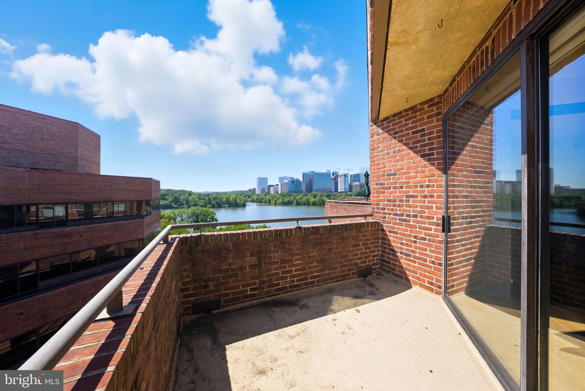 1015 33rd Street Northwest, Unit 809 Washington, DC 20007 - Photo 23 of 39 a view of roof deck with patio