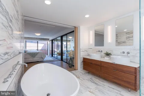 a bed room with a bed and a couch