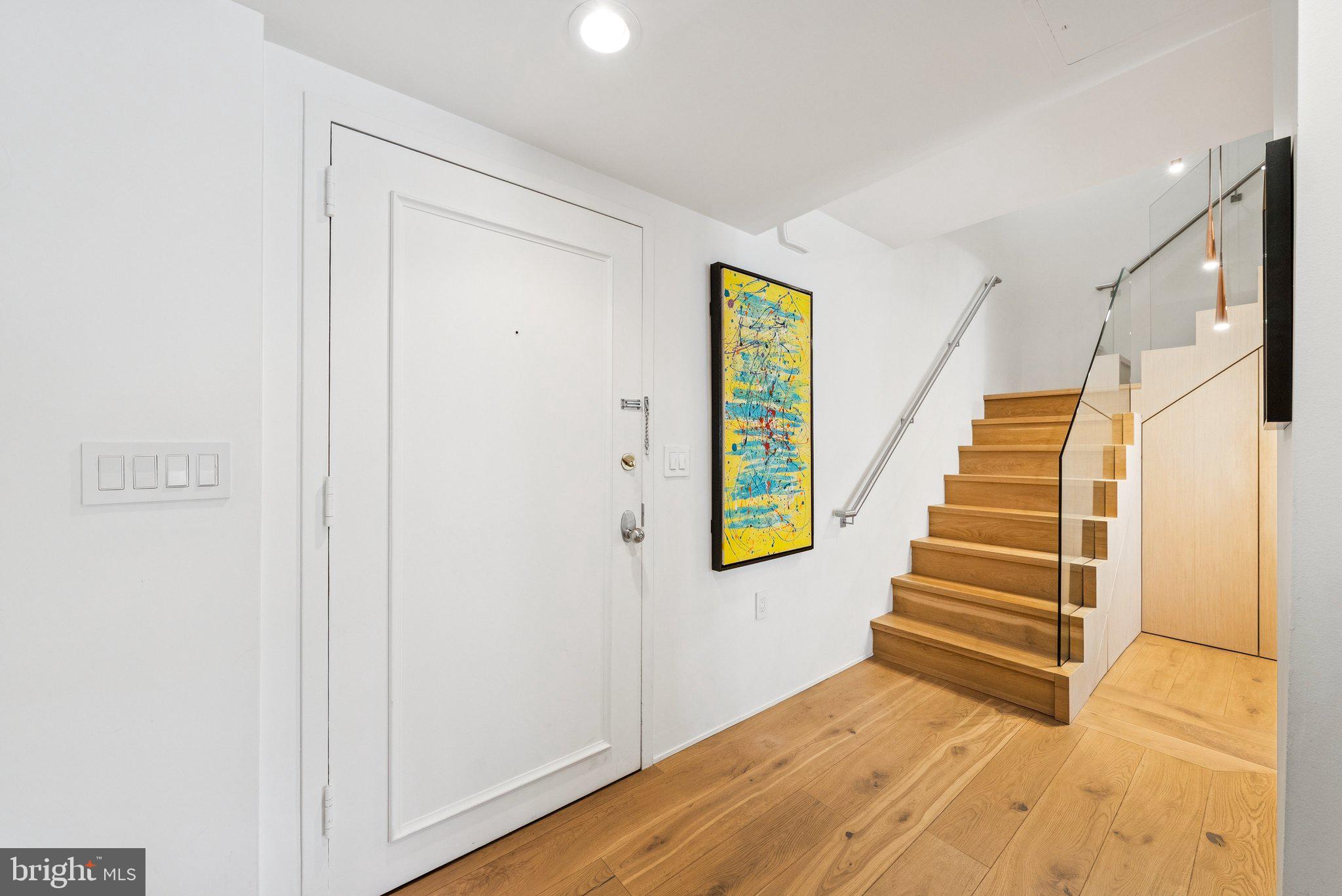 1015 33rd Street Northwest, Unit 809 Washington, DC 20007 - Photo 5 of 39 a view of entryway and hall with wooden floor