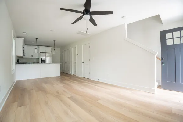 a view of a kitchen with a sink and cabinet area