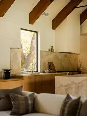a room with a large window and a table
