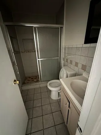 a bathroom with a sink and toilet