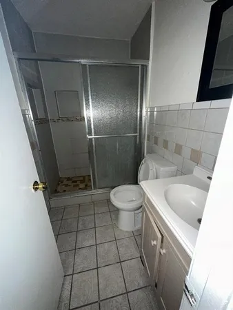 a bathroom with a sink and toilet