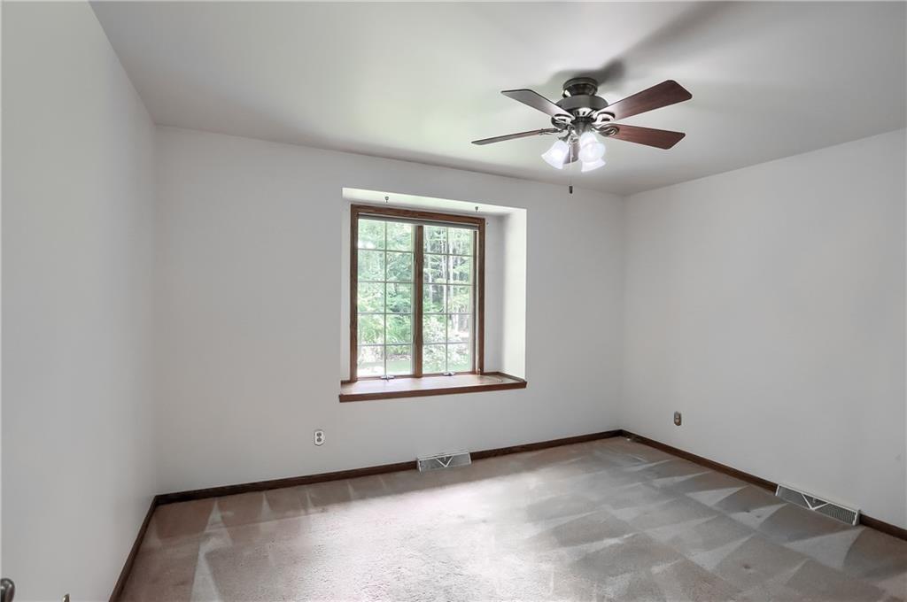 2901 Rosedale Avenue New Castle, PA 16105 - Photo 20 of 25 an empty room with a window and a fan