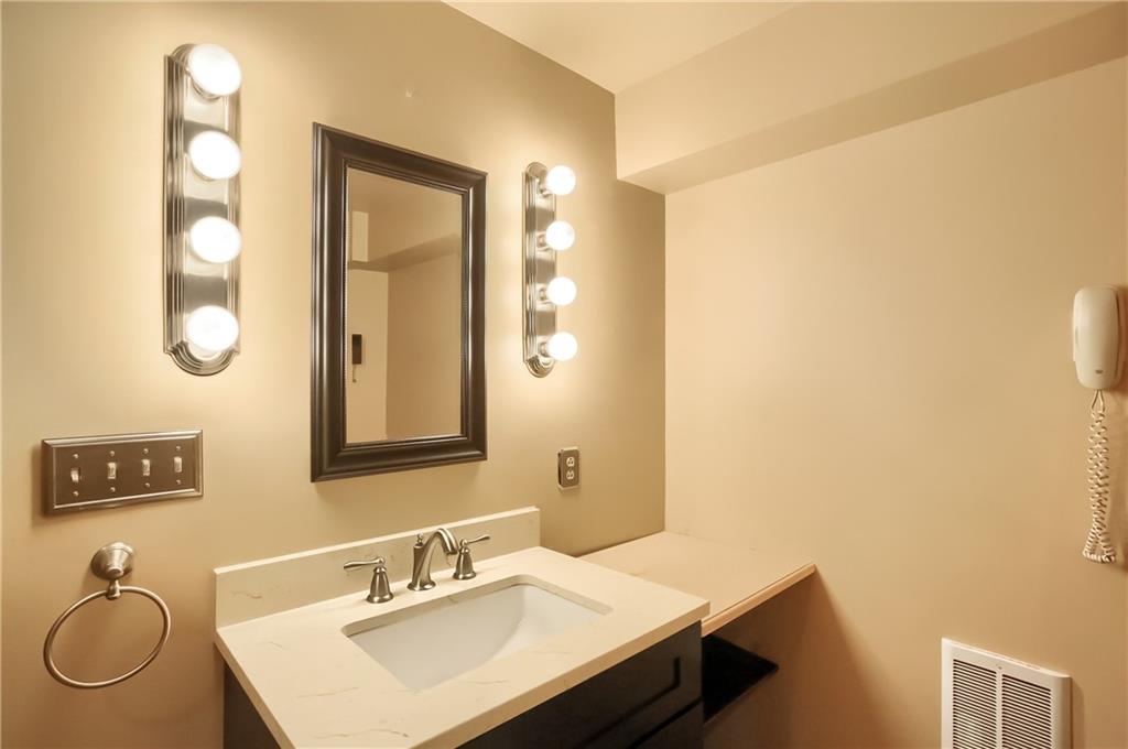 2901 Rosedale Avenue New Castle, PA 16105 - Photo 21 of 25 a bathroom with a sink vanity granite and a mirror