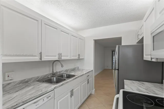 $235,000 | 1400 Southwest 124th Terrace, Unit 109Q, Pembroke Pines, FL 33027