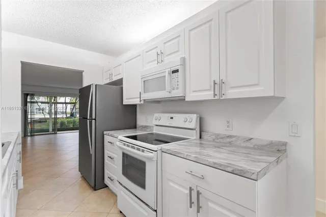$235,000 | 1400 Southwest 124th Terrace, Unit 109Q, Pembroke Pines, FL 33027