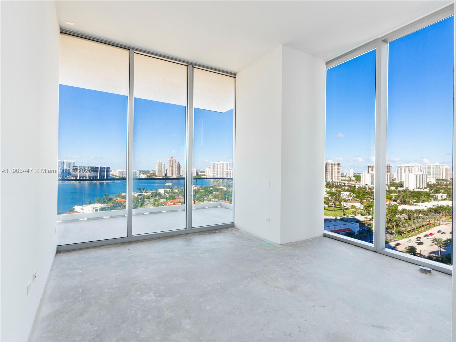 18501 Collins Avenue, Unit 1501 Sunny Isles Beach, FL 33160 - Photo 19 of 35 a view of an empty room with a window