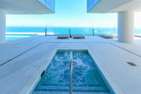 a building with potted plant in front of it