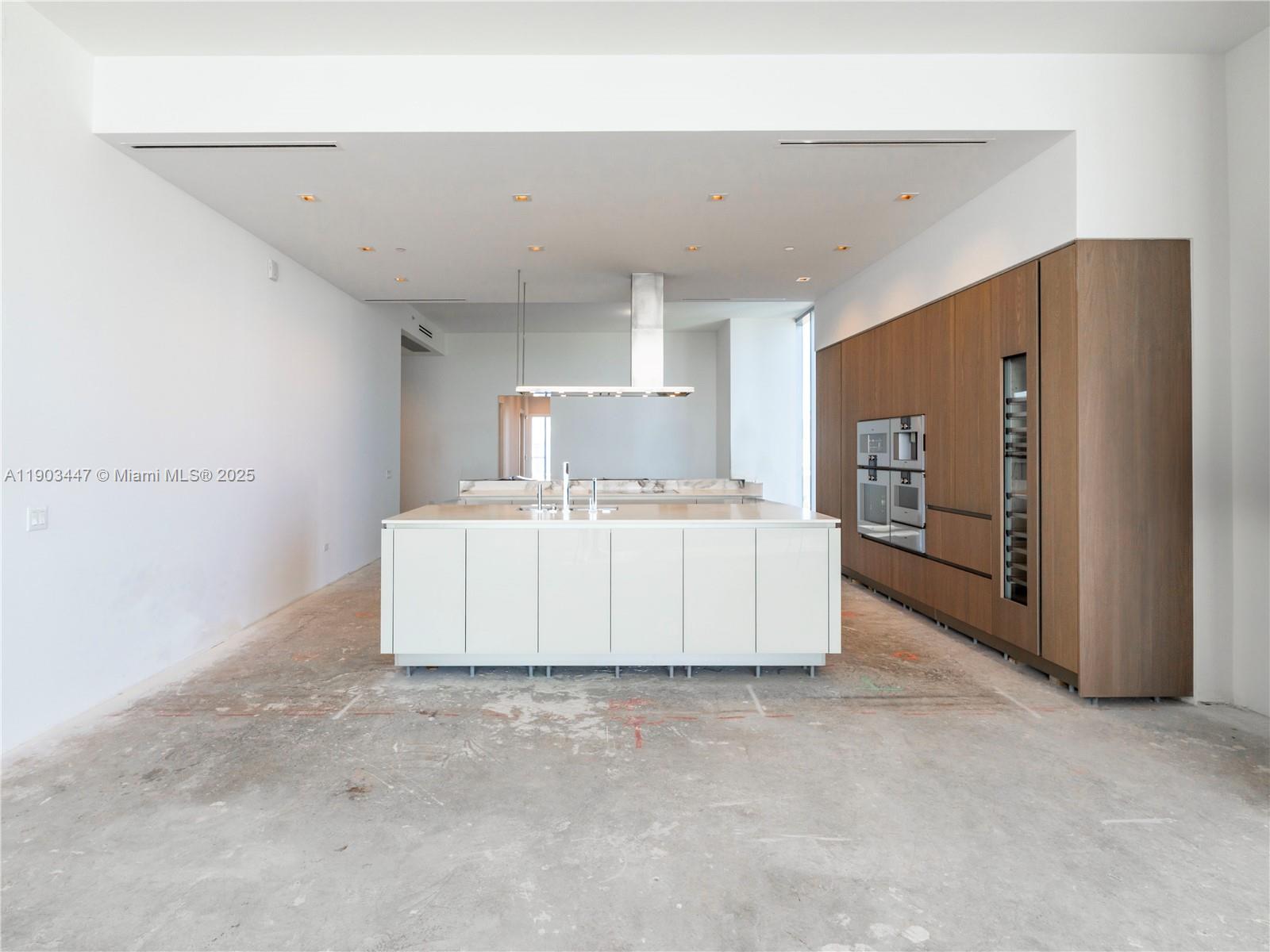 18501 Collins Avenue, Unit 1501 Sunny Isles Beach, FL 33160 - Photo 4 of 35 a view of a kitchen with a sink